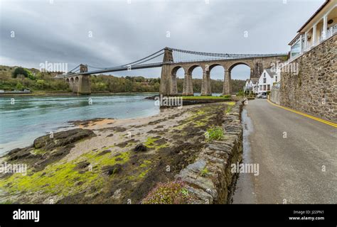 View of the Menai Bridge on Anglesey Stock Photo - Alamy