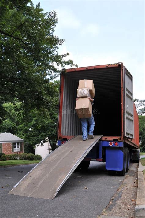 Carrying Boxes Into Moving Truck Stock Photo - Image: 20256528