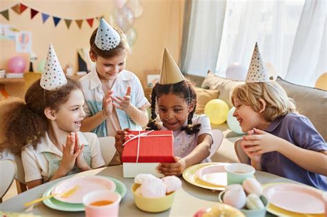 Black Little Girl Holding Birthday Cake with Candles and Smiling at ...