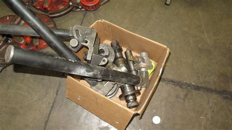 Qty 2 Ridgid 918 Hydraulic Groover, Misc. Parts & Pipe Stands - Oahu Auctions