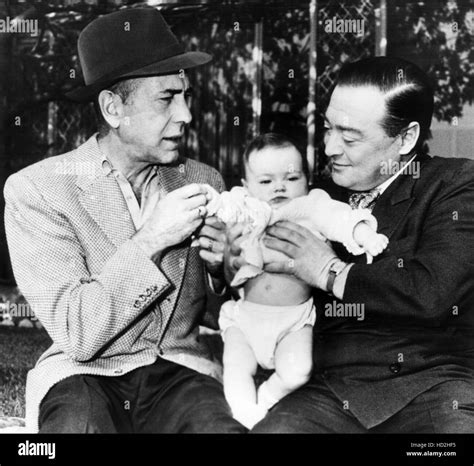 Humphrey Bogart, Peter Lorre with daughter, Catharine Lorre, 1950 Stock ...