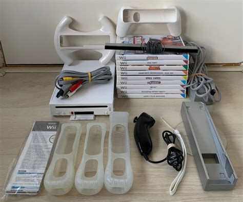 Nintendo - Wii console, accessories + 9 games - Catawiki