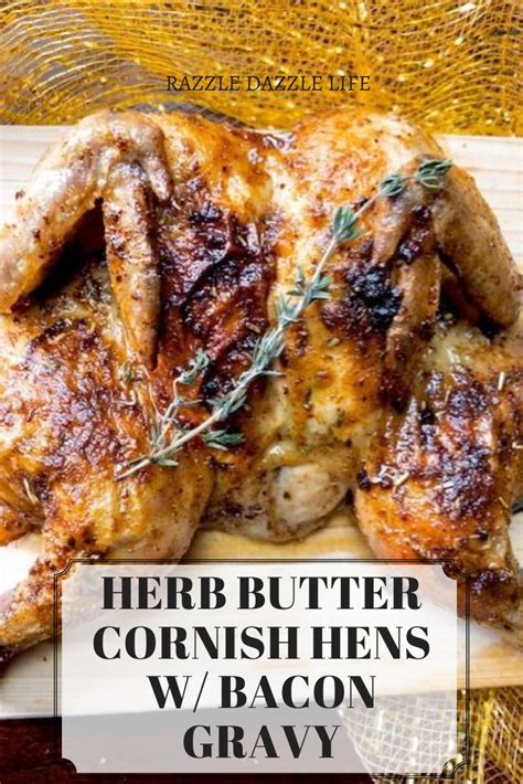 a roasted chicken with herbs on it and the words herb butter cornshens w / bacon gravy