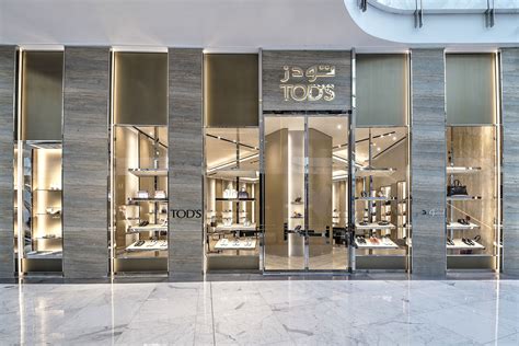 TOD'S Dubai Mall | Supermarket design, Jewelry store interior, Store design interior