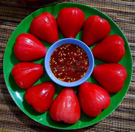 Rujak Buah, Sliced Indonesian Fruit Salad, Served with Spicy Brown Sugar Sauce and Ground ...