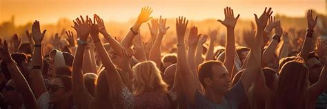 Premium AI Image | crowd at a music festival with hands up