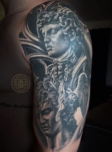 Realistic Perseus and Medusa Statue Tattoo