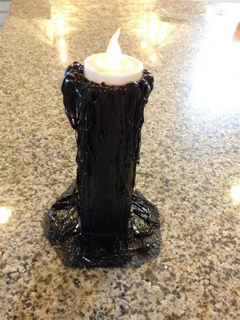 My melty wax LED flicker candle that I made...what do you think? Only cost a couple of boo bucks ...