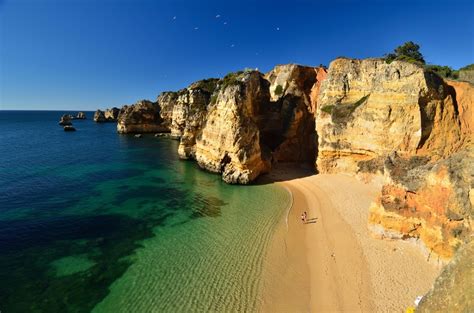 Pristine Beaches and Dramatic Shoreline in Lagos, Portugal - Places To See In Your Lifetime