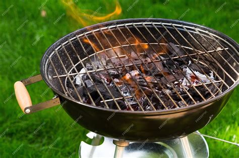 Premium Photo | Metal brazier with fire outdoor, close up