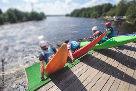 Kayak slalom canoe race in white water rapid river, process of kayaking ...