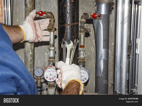 Plumber Repairs Pipes Image & Photo (Free Trial) | Bigstock