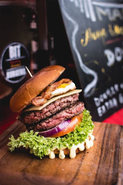 Free Photo: Double Beef Burger with Bacon, Cheddar and Tomato