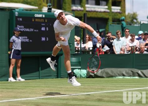 Photo: Denis Shapovalov vs Gregoire Barrere at Wimbledon 2023 ...