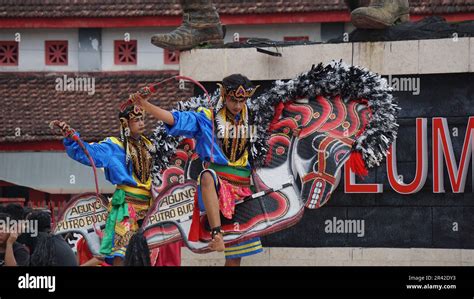 Jaranan dance, a traditional dance from Java. Jaranan comes from jaran which means horse Stock ...