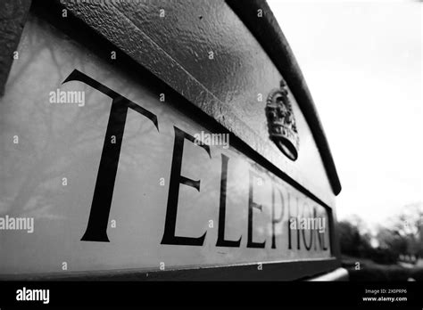 B&W Telephone Box Sign Stock Photo - Alamy