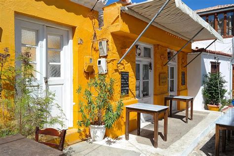 Greek Restaurant in Hydra Greece Photograph by Nadia Seme | Fine Art America