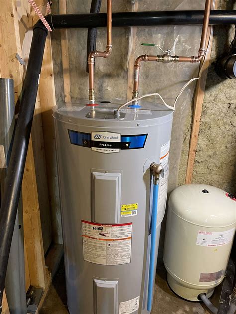 Installed new electric hot water tank in West Guilford