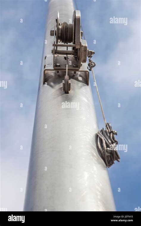 Flag pole pulley hi-res stock photography and images - Alamy