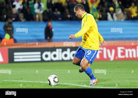 Luis Fabiano of Brazil scores the 2-0 during the 2010 FIFA World Cup Round of Sixteen match ...