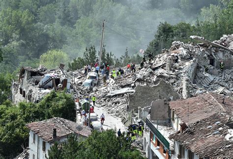 Italy earthquake kills at least 247 people as rescuers race to free ...