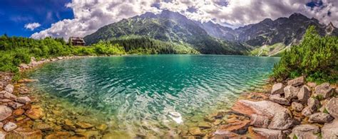 Premium Photo | Panorama of lake in the tatra mountains at sunrise