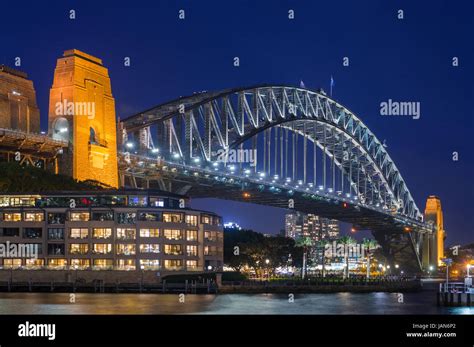 Sydney Harbour Bridge with Hyatt Park Hotel at dusk. Sydney, NSW ...