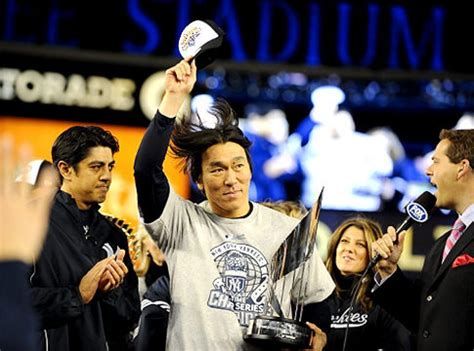 Hideki Matsui holds MVP trophy after winning the 2009 World Series with ...