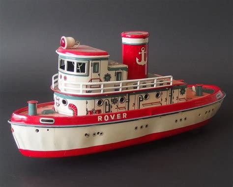 Lot - VINTAGE LITHO-TIN 'ROVER' TUGBOAT TOY