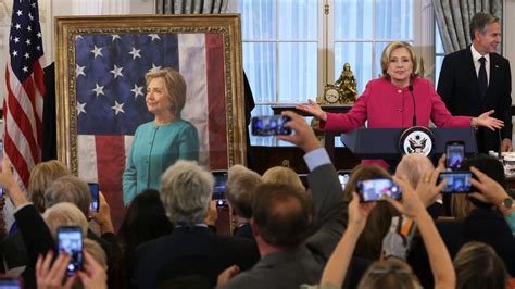 Hillary Clinton at portrait unveiling swipes at Trump, Putin