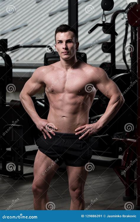 Healthy Man with Six Pack stock image. Image of model - 129886391