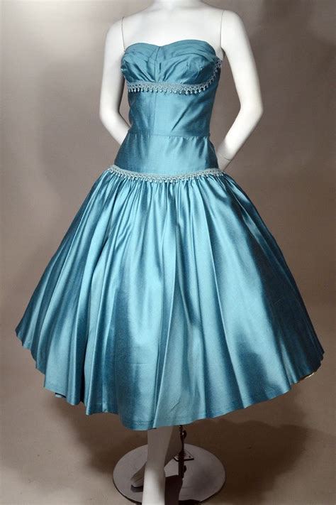 IRIDESCENT LIGHT TEAL BLUE FULL SKIRTED 1950's VINTAGE PARTY DRESS WITH SHELF BUST. Available ...