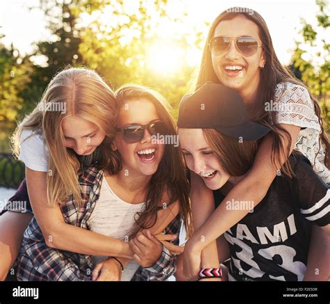 Group of friends laughing and having fun Stock Photo - Alamy