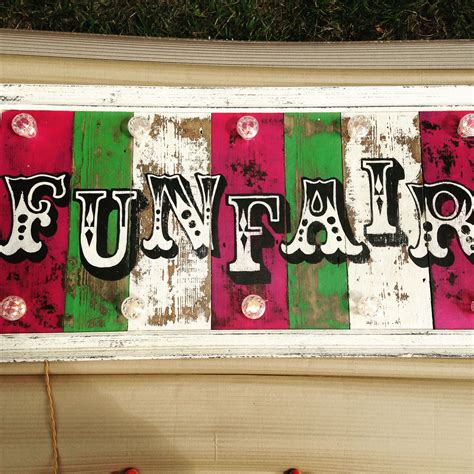 This funfair sign with fabulous green, pink and white stripes screams fairground art and circus ...