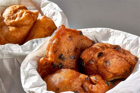 Oliebollen With Precooked Apples And Raisins Authentic Recipe | TasteAtlas