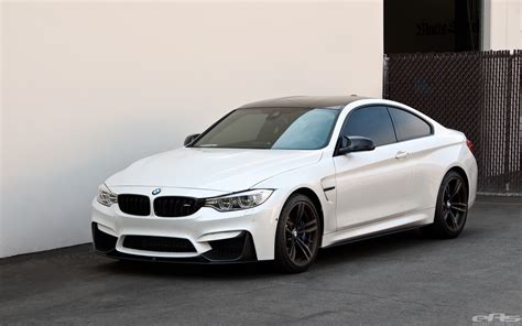 Mineral White M4 gets the M Performance Aero Package | BMW Performance Parts & Services