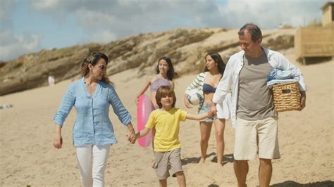 A Family Walking at the Beach · Free Stock Video