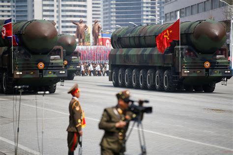 North Korea rolls out new missiles during huge military parade - CBS News