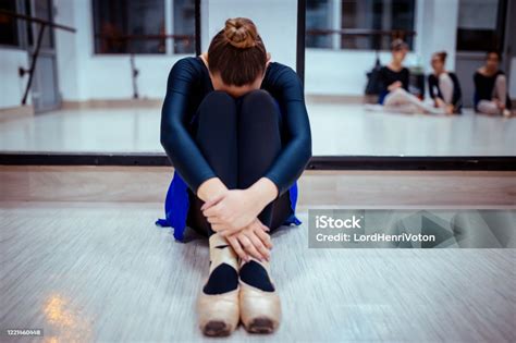 Sad Ballerina Is Sitting On Floor Stock Photo - Download Image Now - Sadness, Ballet Dancer ...