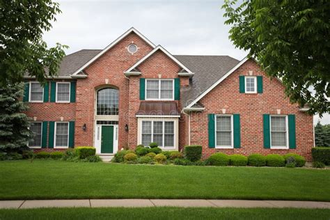 Red Brick House stock photo. Image of brick, shrubs, sale - 19727396