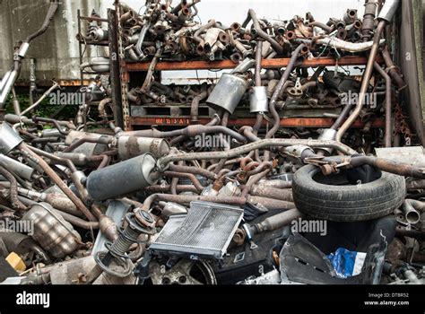 Heap of car parts in a scrap yard UK Stock Photo - Alamy