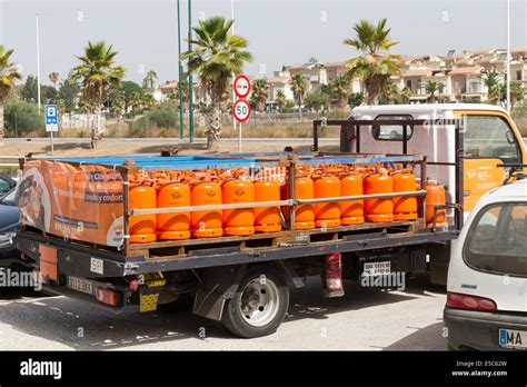 Butane gas bottle delivery vehicle in Spain Stock Photo - Alamy