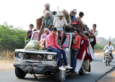 Overloaded Public Transport Photograph by Devendra Dube - Pixels