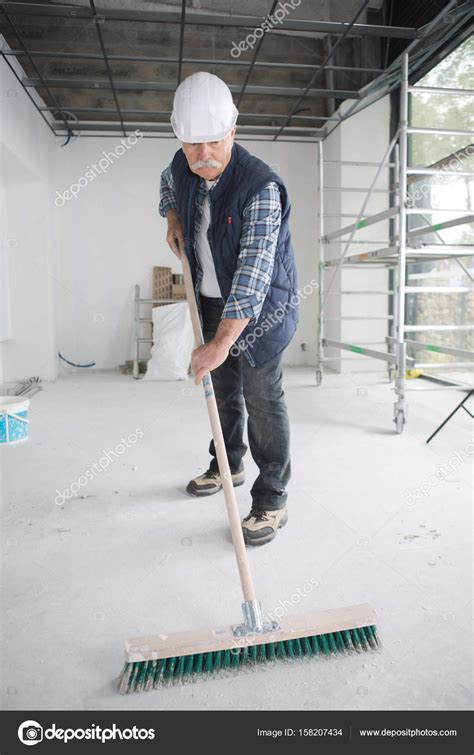 Sweeping the floor of dust Stock Photo by ©photography33 158207434