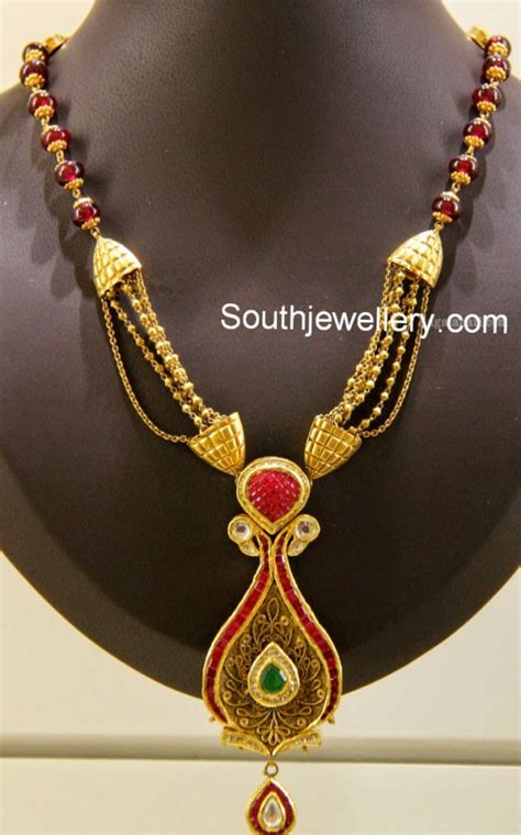 Antique Ruby Beads Necklace with Peacock Pendant - Jewellery Designs