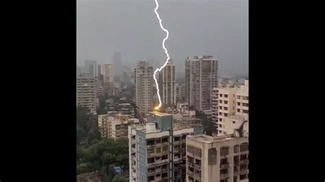 Strong bolt of lightning strikes high-rise building in Mumbai, stuns ...