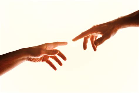 Two Hands With Fingers That Almost Touch Isolated White Stock Photo - Download Image Now - iStock