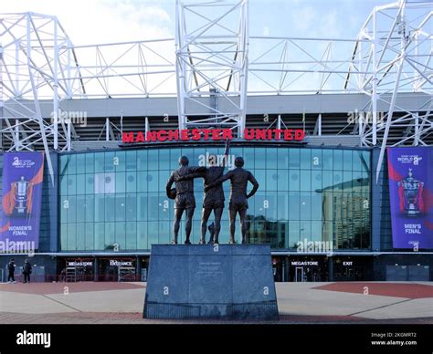 Trinity Statue of George Best, Bobby Charlton, and Denis Law outside of ...