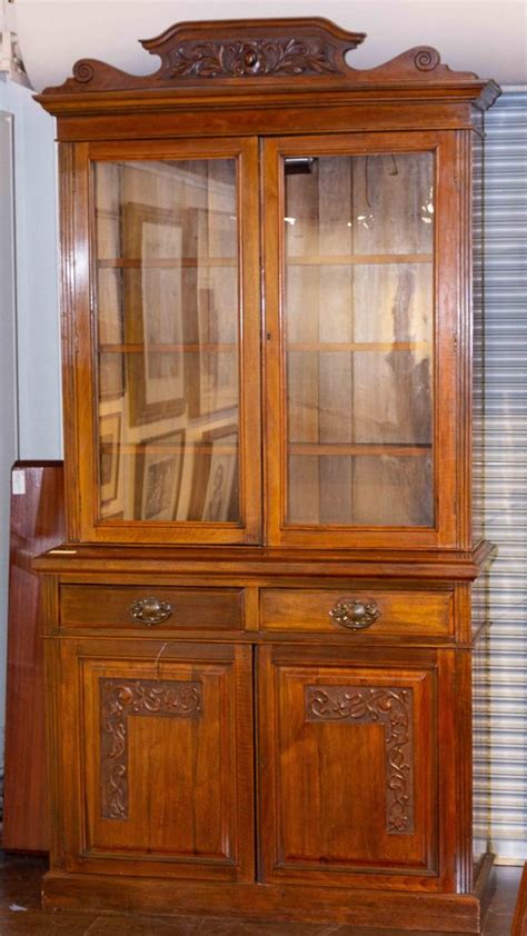 Lot - A mahogany display cabinet, 85 1/2 x 48 x 18 in. (217 .1 x 121.9 x 45.7 cm)