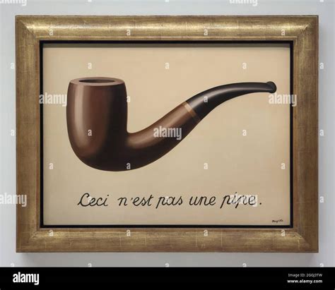 Rene magritte treachery of images hi-res stock photography and images ...